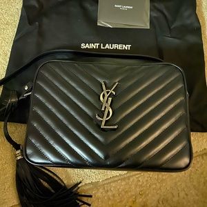 Ysl bag camera bag with removable tassel.